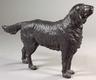 A painted black cast iron figure of a setter