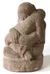 A stone folk carving of a mother holding a child by Maruice Glickman