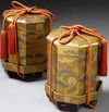 Two octagonal shell game boxes
