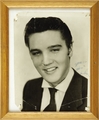 An Elvis Presley black & white autographed photograph of a young Elvis, inscribed