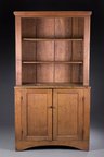 An open-top, step-back walnut cupboard, American, first half of the 19th century
