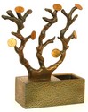 A Banthrico white metal Penny Tree coin bank with 1953 pennies in tree branches