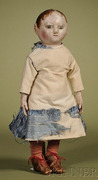An Izannah Walker cloth Child doll, oil-painted stockinette with brown eyes, wispy brown hair with fine brush strokes, applied ears, pink cheek blush and painted closed mouth