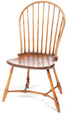 A Boston windsor side chair with bamboo turnings and unusual curved stretcher