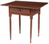 A New England red painted one-drawer work table with turned legs terminating in button feet, attributed to the Shakers