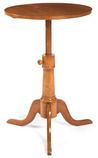 An adjustable height candlestand, possibly in cherry, with circular top and cabriole legs terminating in slipper feet, attributed to the Harvard Shakers