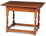 A Queen Anne pine and maple tavern table having a breadboard top on block and turned legs joined by a box stretcher