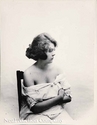 Ernest Bellocq silver gelatin photograph of a Storyville woman in a white dress