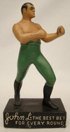 A Sullivan Irish Whiskey display figure of the late 19th century boxing champ John L. Sullivan