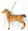 A Dresden molded and painted paper horse with saddle Christmas tree ornament