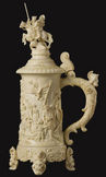 A carved French ivory tankard celebrating the glory of Constantine the Great, possibly Dieppe, circa 1875. Carved in the round, depicting the conversion of Romans to Christianity