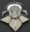Silver and rock crystal dress clip, Margret Craver, circa 1936, the bold geometric clip centering a circular cabochon with faceted underside