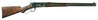 A Winchester Deluxe Model 1886 Lever Action Rifle with nickel steel barrel, checkered pistol grip and figural stock