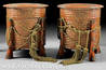 A pair of Japanese gilt decorated red lacquered shell game boxes, Kai-oke, Meiji Period, 19th century, ribbed circular bodies and covers raised on four splayed buttress supports