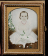 Attributed to Clarissa Peters Russell (Mrs. Moses B. Russell) Circa 1840 portrait miniature painting of a child in a white dress wearing a coral bead necklace