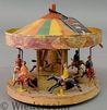 A Britains Round-A-Bout & Circus toy merry-go-round or carousel with painted metal carousel horses and riders