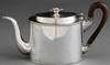 A French silver on copper argyle, circa 1820, oval drum form with gooseneck spout and original pearwood handle, floral bud finial