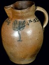 Evan Ricketts stoneware pitcher with cobalt tree and date of July 4, 1833, from Maysville, Kentucky