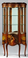 A Cincinnati late 19th to early 20th century Robert Mitchell Louis XV style polychromed and ormolu mounted vitrine or display cabinet