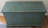 A paint-decorated Maine blanket chest with bracket base, blue ground with stenciled stars, first half of the 20th century
