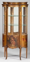 An American (probably Cincinnati, Ohio), late 19th-early 20th century Louis XV style display cabinet, attributed to Robert Mitchell