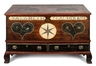An inscribed and dated 1809 Pennsylvania paint decorated dower chest having for large hearts, a six pointed star and philphlots on either end; with two drawers and ogee bracket feet