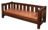 An Arts & Crafts settle by J.M. Young, crib form with slat back and sides, American, early 20th century