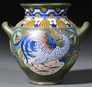 A Zuid Holland Gouda Rhodian pottery handled jar, Netherlands, 1915 to 1918, retailed by Liberty & Co., London, stamnos-form, decorated with a pheasant
