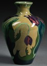 A Zuid Holland Gouda pottery high glaze shouldered vase, Netherlands, early 20th century, polychrome hand-painted with tulip design