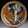 A Zuid Holland Gouda pottery matte glaze charger, Netherlands, 1926, designed by Henri Breetvelt, circular, with polychrome abstract floral