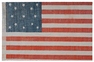 A 13 Star starched gauze printed national parade flag with wreath pattern made for the U.S. Centennial