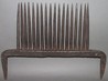 A wrought iron flax ripple with floret maker's mark