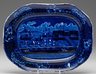 An English, second-quarter nineteenth century, historical blue Staffordshire platter depicting the Landing of Gen. LaFayette At Castle Garden New York, 16th August 1824, floral border