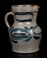 Stoneware pitcher marked for Maysville, Kentucky merchants Cooper and Power, with cobalt oval and swag decoration