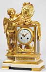 A French crystal regulator with figural gilt brass Cupid and movement stamped Marti et Cie
