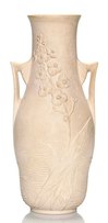A Roseville pottery, handled, pink experimental vase, most likely designed for the Silhouette line by Frank Barks but never glazed, carved and signed with Barks' initials on the bottom. On the back is Arrowhead White Yellow centres