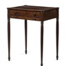 A mahogany Sheraton sewing table with a single drawer and reeded legs, School of Samuel McIntire and William Hook, Massachusetts
