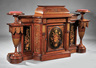 American Renaissance ebonized, parcel gilt, marquetry and burl walnut cabinet and pedestals, mid‑19th century, attributed to Thomas Brooks, New York, sold with an incised walnut mirror (not shown)