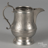 A Cincinnati pewter cream pitcher by Homan & Co.