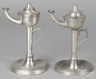 A pair of pewter oil or fat lamps, one marked Homan & Co.