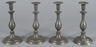 A set of four pewter candlesticks likely by Cincinnati maker Flagg and Homan