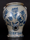 Important and Possibly Unique Stoneware Pedestal-Based Water Cooler with Profuse Cobalt Tulip Decoration, Inscribed in Cobalt