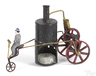 A Schoenner steam powered tricycle with candle powered boiler