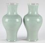 A pair of Chinese porcelain celadon glazed vases, apocryphal Qianlong four character mark