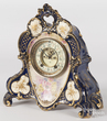 A Royal Bonn porcelain mantel clock with Ansonia works
