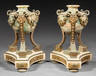 Pair of Napoleon III Bronze‑Mounted Marble Cassolettes, late 19th c., incurvate triangular base, mounted with ram's heads and garlands