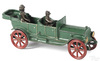 An A. C. Williams cast iron open touring car with driver and passenger
