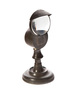 An American pewter bull's eye whale oil lamp in the style of Roswell Gleason