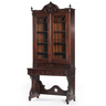 A Mitchell & Rammelsberg two-piece Gothic Revival secretary bookcase in mixed woods with faux rosewood finish, Ohio, mid-19th century