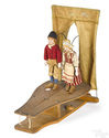 A Schoenhut Jolly Jiggers dancing toy with Dutch children